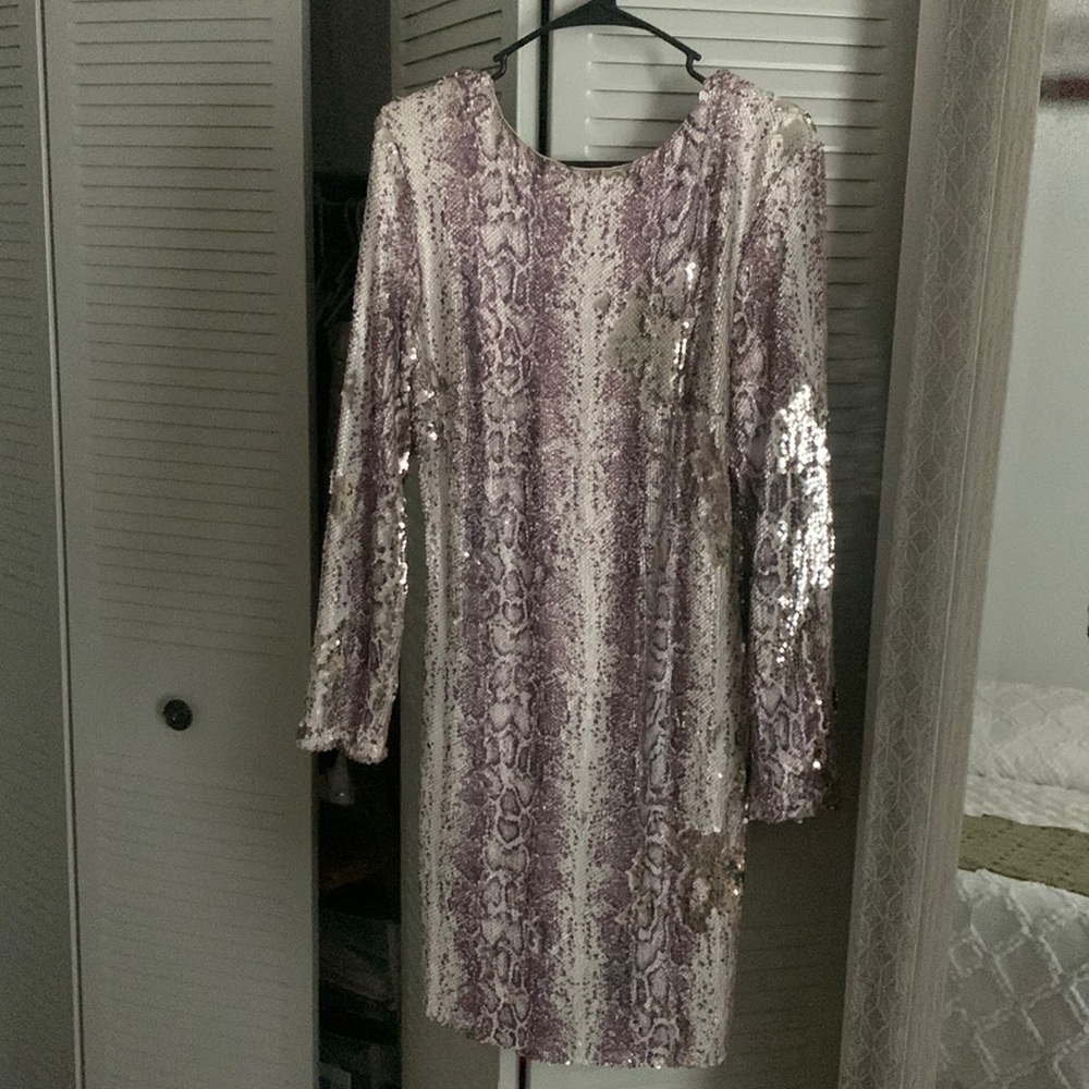 DRESS THE POPULATION … WORN ONCE!